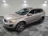 a picture of a silver suv parked in a garage