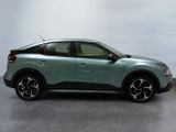 the new nissan c - hr suv is parked in a showroom