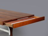 a close up of a table with a wooden top and metal legs