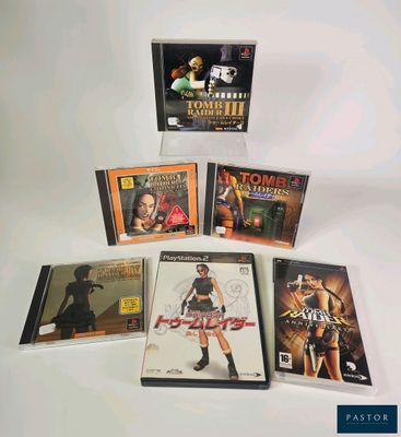 quatre DVD posés sur une surface blanche