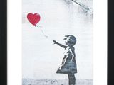 framed picture of a girl with a red balloon in the shape of a heart