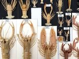 a lot of different types of lobsters displayed on the wall