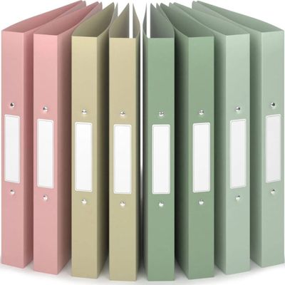 a row of binders with different colors of binders on them