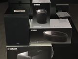 boxes of speakers are stacked on top of each other on the floor