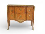an antique wooden chest of drawers with brass handles and drawers