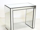 an image of a glass table with a mirror top