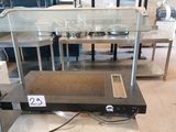 an image of a commercial kitchen with a glass counter top