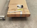 a large cardboard box sitting on the floor in a warehouse