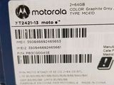 the back of a motorola cell phone with a barcode on it