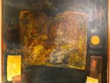 une image représentant un tableau sur lequel figurent un canapé et une lampe posée sur une table