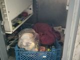 a microwave with a basket of food inside of it