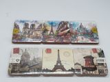 a picture of a set of three postcards on a table