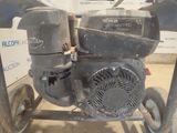 a small engine that is sitting on a cart