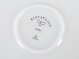 a white plate with a black and white label on it