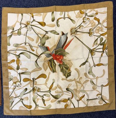 an image of a square scarf with a bird on it