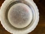a close up of a glass plate on a table