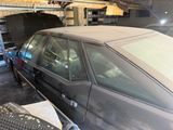 a car that is parked in a garage with a keyboard on it
