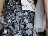 a box full of screws and nuts in it