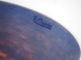 a close up of a blue bowl with writing on it