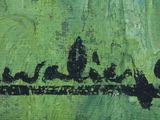 an image of a green painting with a black writing on it