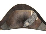 an image of a hat with a feather on it