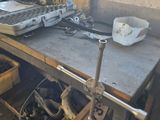 a workbench with tools on it in a garage