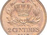 a close up of a coin with a crown on it