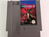 an old nintendo game cartridge with the cover of gremlin ' s 2