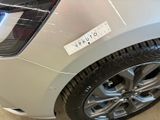 a close up of a car with a sticker on the side of it