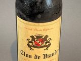 a bottle of wine that is sitting on a table