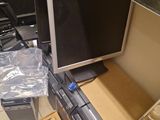 a television sitting on top of a shelf in a room