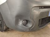 a close up of the front bumper of a car