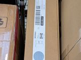 a box that is sitting on the floor next to some boxes