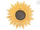 a yellow sunburst on a white background with a white background
