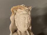 a statue of a woman with a crown on her head