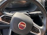 dashboard of a car with a steering wheel and dashboard controls