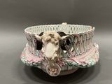 a ceramic bowl with a cow ' s head on it