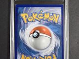 a close up of a pokemon card on a table