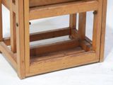 a small wooden table with a drawer underneath it