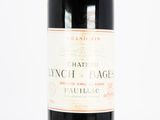 a bottle of wine that is sitting on a table