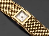 une montre-bracelet en or 18 carats