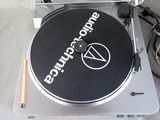 a turntable with a vinyl record on top of it