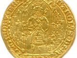 une pièce d'or à l'effigie d'une femme