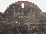 a rusted metal plaque on a white background