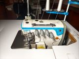 a sewing machine that is sitting on a table