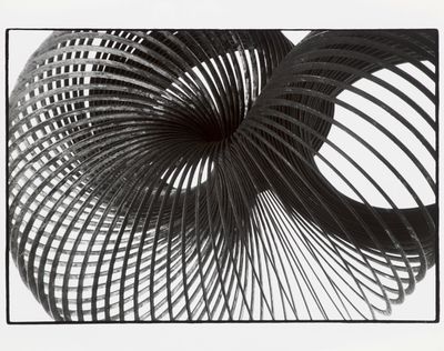 a black and white photo of a spiral object
