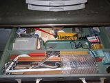 a drawer that has a bunch of items in it