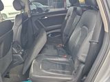 the back seats of a car are empty in the parking lot