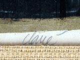 a picture of a close up of a piece of fabric with writing on it