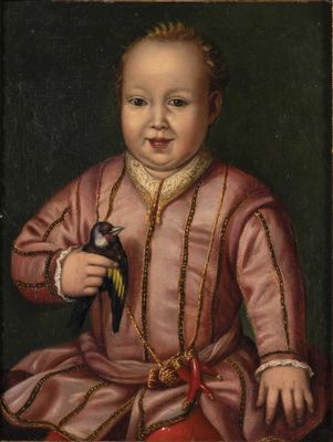 portrait d'un enfant en robe rose tenant un oiseau